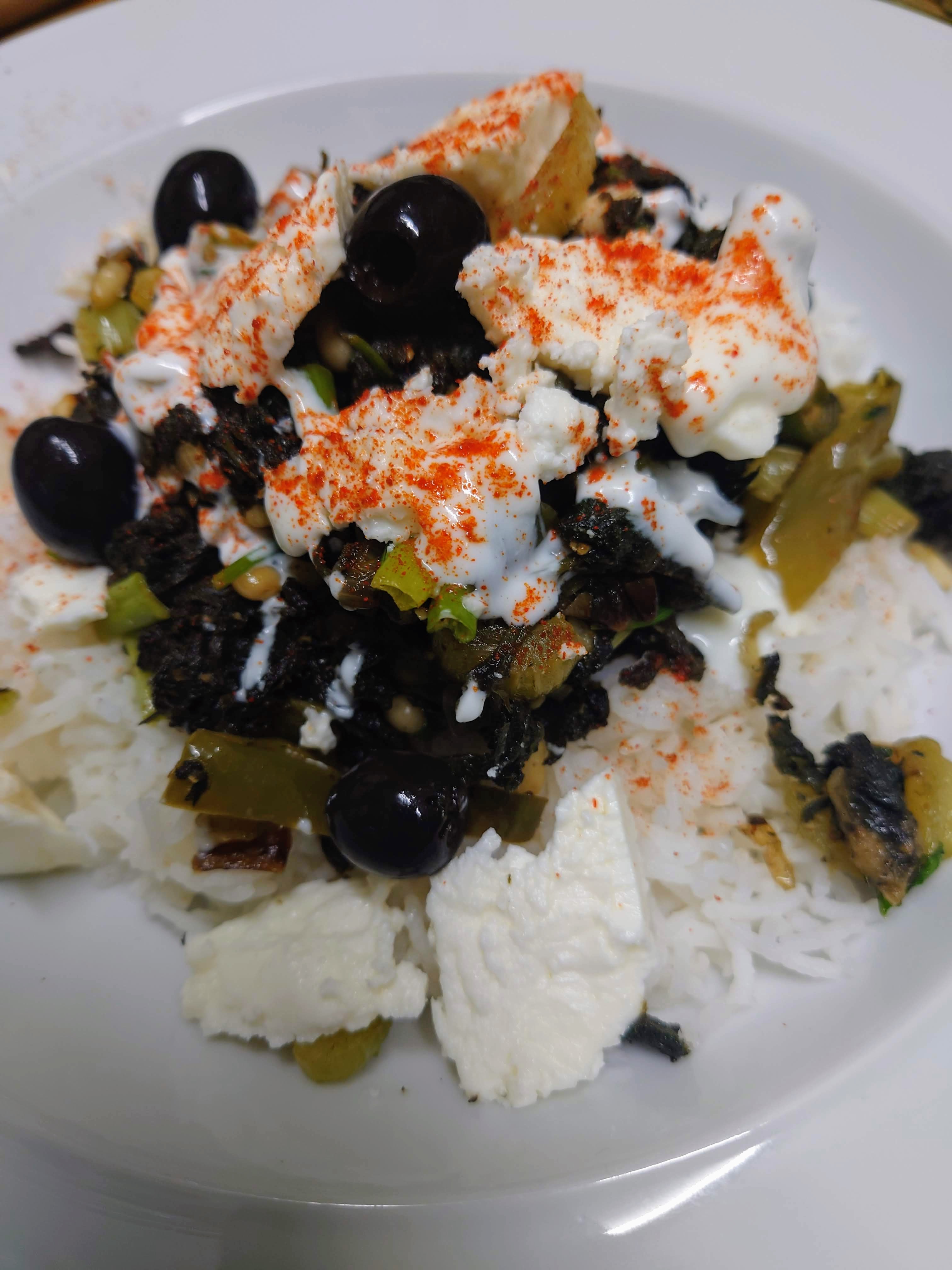 Mediterranean-style Nettles With Hogweed, Lime, Chilli, Pine Nuts, Olives, Feta, Rice And Kaffir Yogurt
